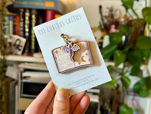 Dragon Book Charm Keyring